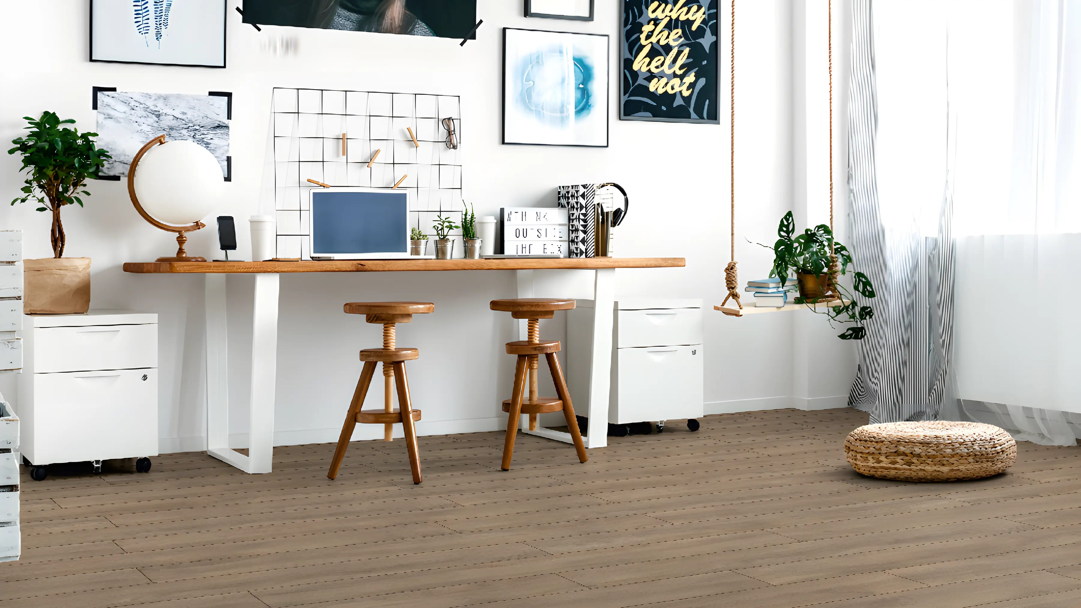 Oak laminate in a bright home office with a desk under the window