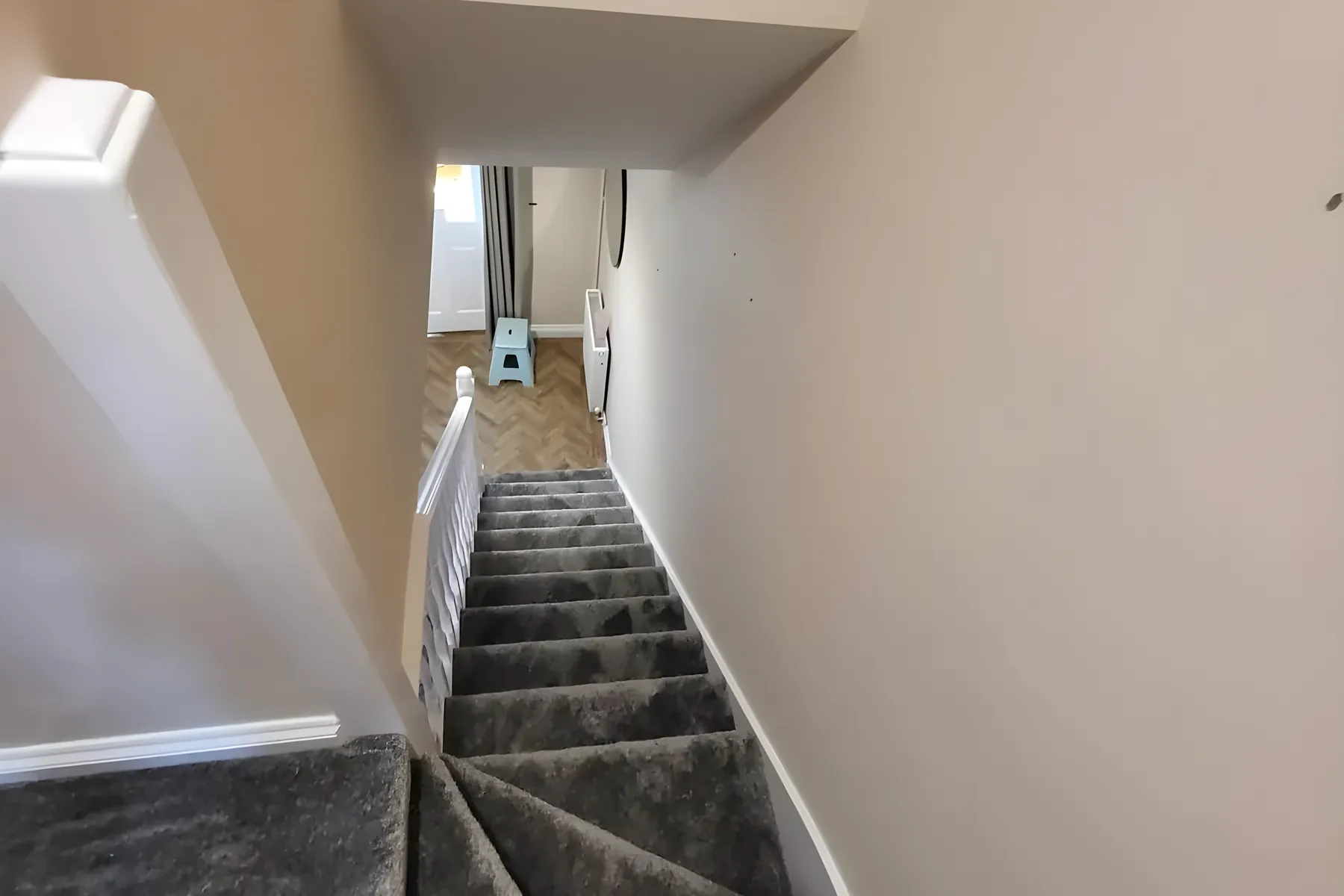 Looking down a grey stair carpet fitted by Park Flooring