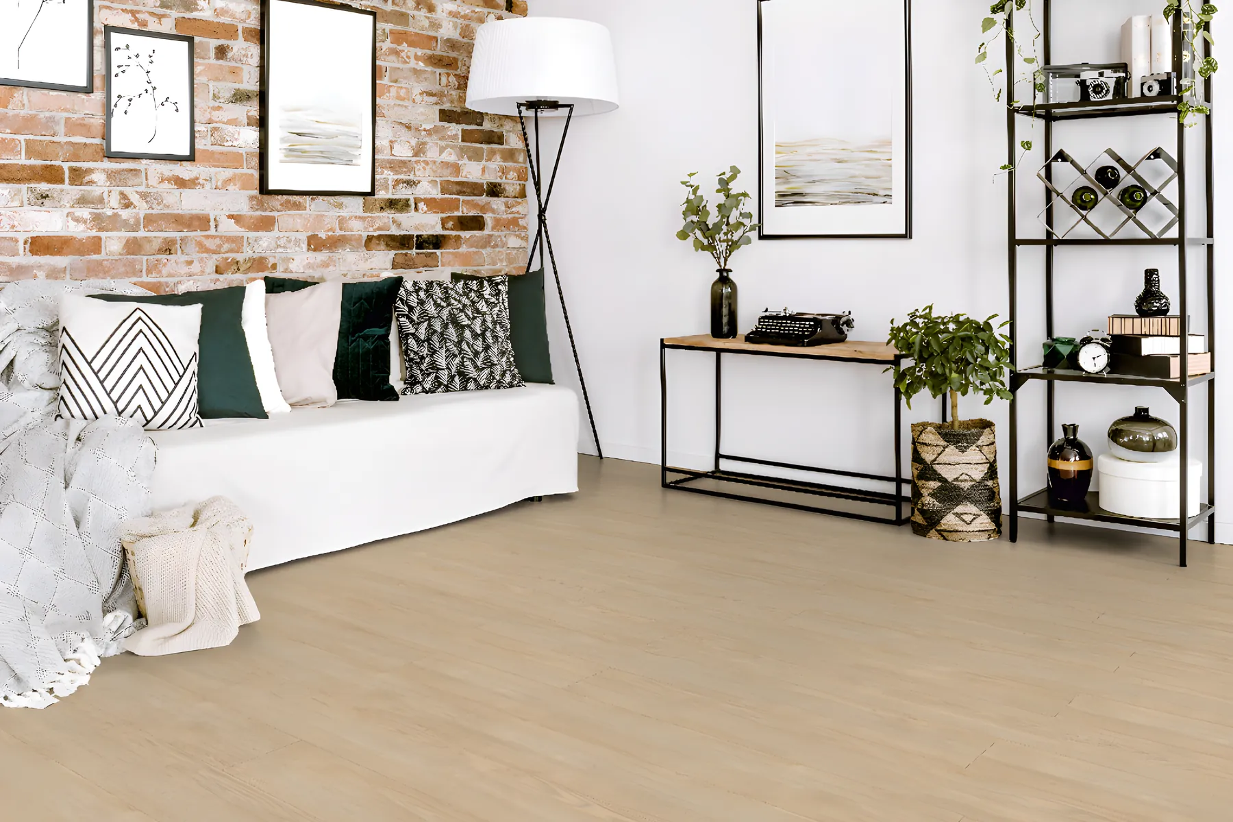 Light oak laminate against an exposed brick wall