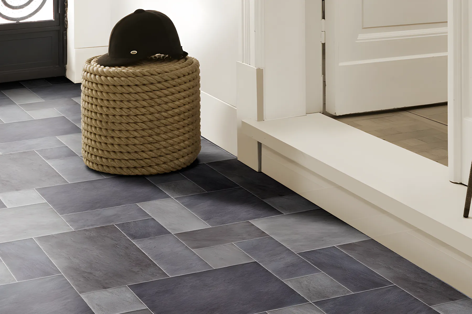 Grey tile effect sheet vinyl in a hallway