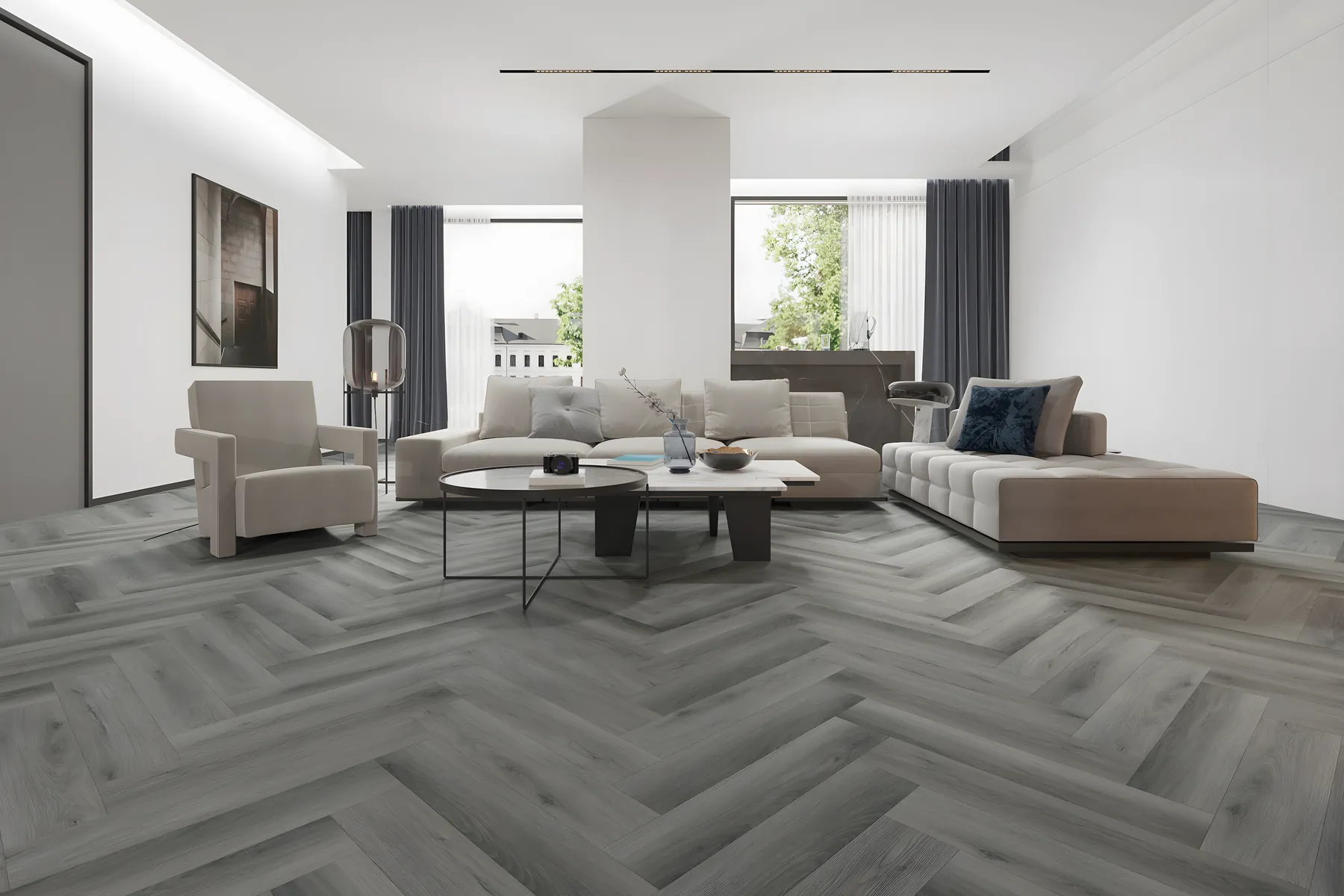 Grey herringbone luxury vinyl tile in a large open plan room